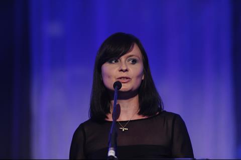 Retail Week's Jennifer Creevy welcomes guests at the PayPal Etail Awards 2013